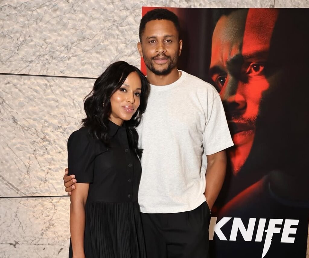 Kerry Washington Stuns in Black Tory Burch Dress Paired with Chic Desert Beige and Orange Prada Galleria Bag at The Knife Screening