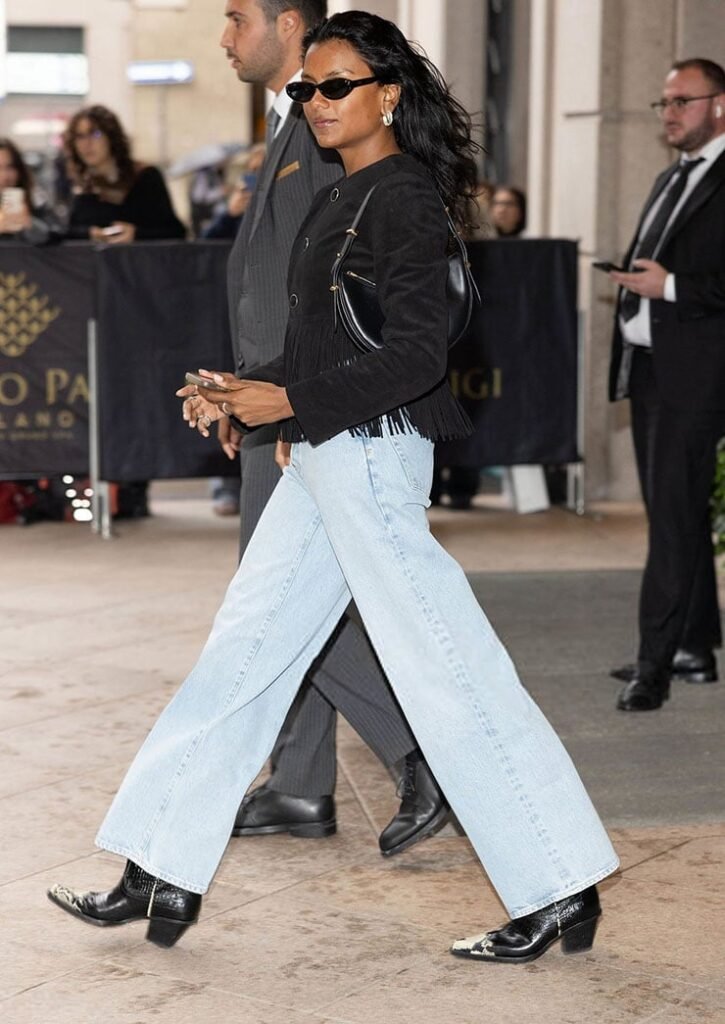 Elevate Your Style: Discover Simone Ashley’s FRAME Saddle Jacket Paired with Trendy Collegiate Jeans